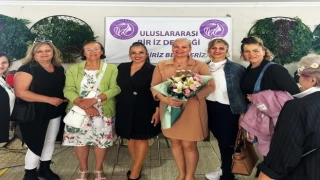 DÜNYA MEDENİYETLER KOROSU'NDAN PAMUK BAKIM EVİ'NDE YAŞAYAN ENGELLİLERE MİNİ BİR KONSER